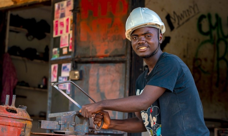 A welding apprentice in Tanzania