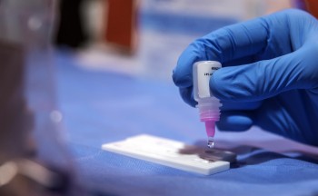 An HIV test is completed in Ukraine. Credit: Pact