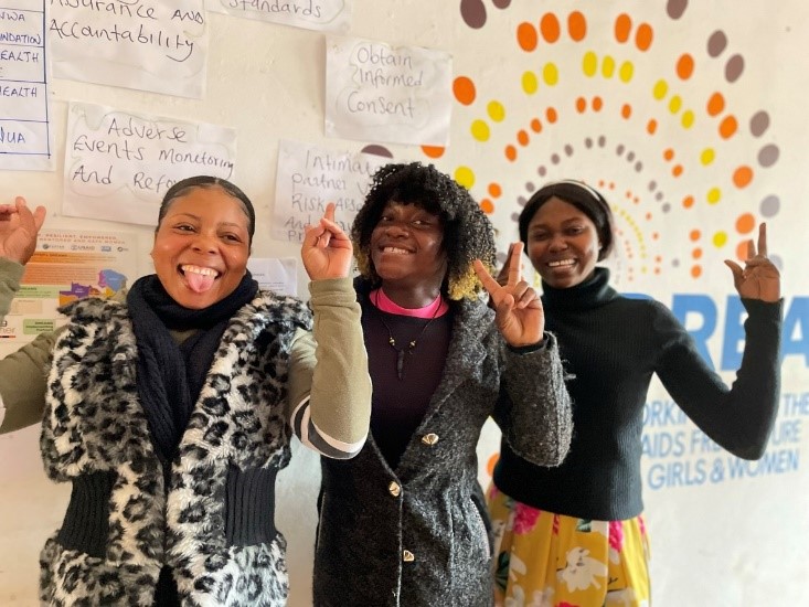 A group of women posing for a photo

Description automatically generated