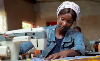 A woman who participated in the Children Out of Mining activities. Photo by Maynard Muchangwe for Pact. 