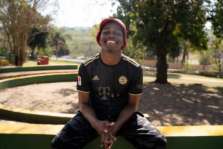 A youth in Eswatini who participated in a Pact-led project and received support to complete his education.